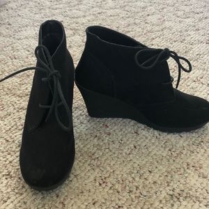 Black wedge booties